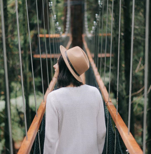 Solo traveller exploring Redwoods forest in Rotorua